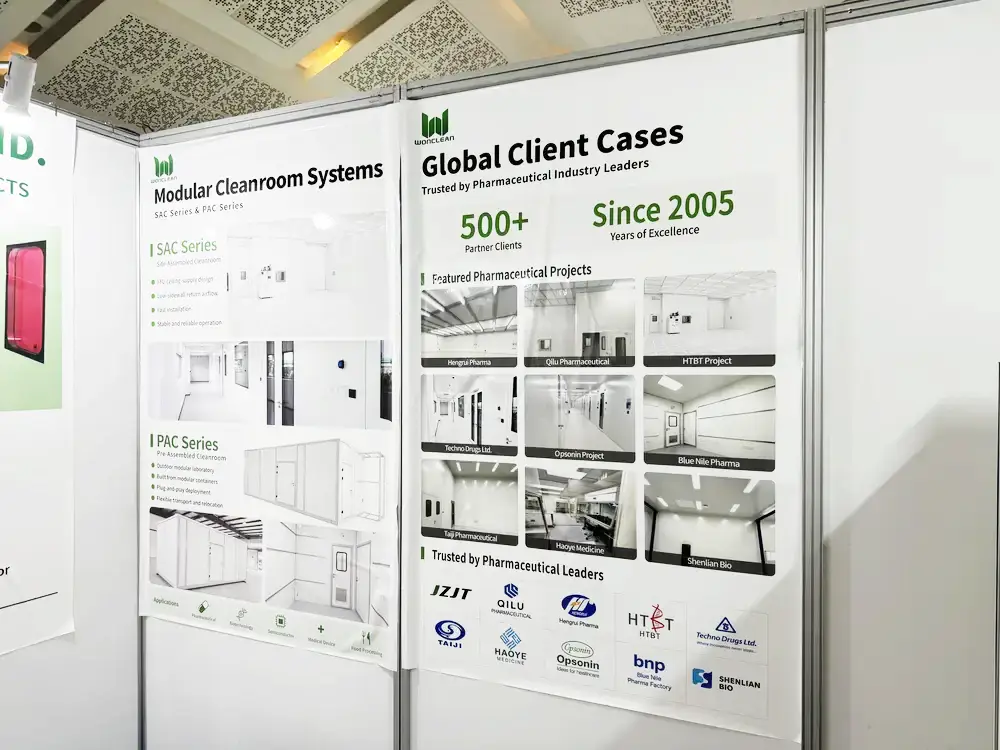 WONCLEAN exhibition displays describing SAC and PAC modular cleanroom series alongside project photographs